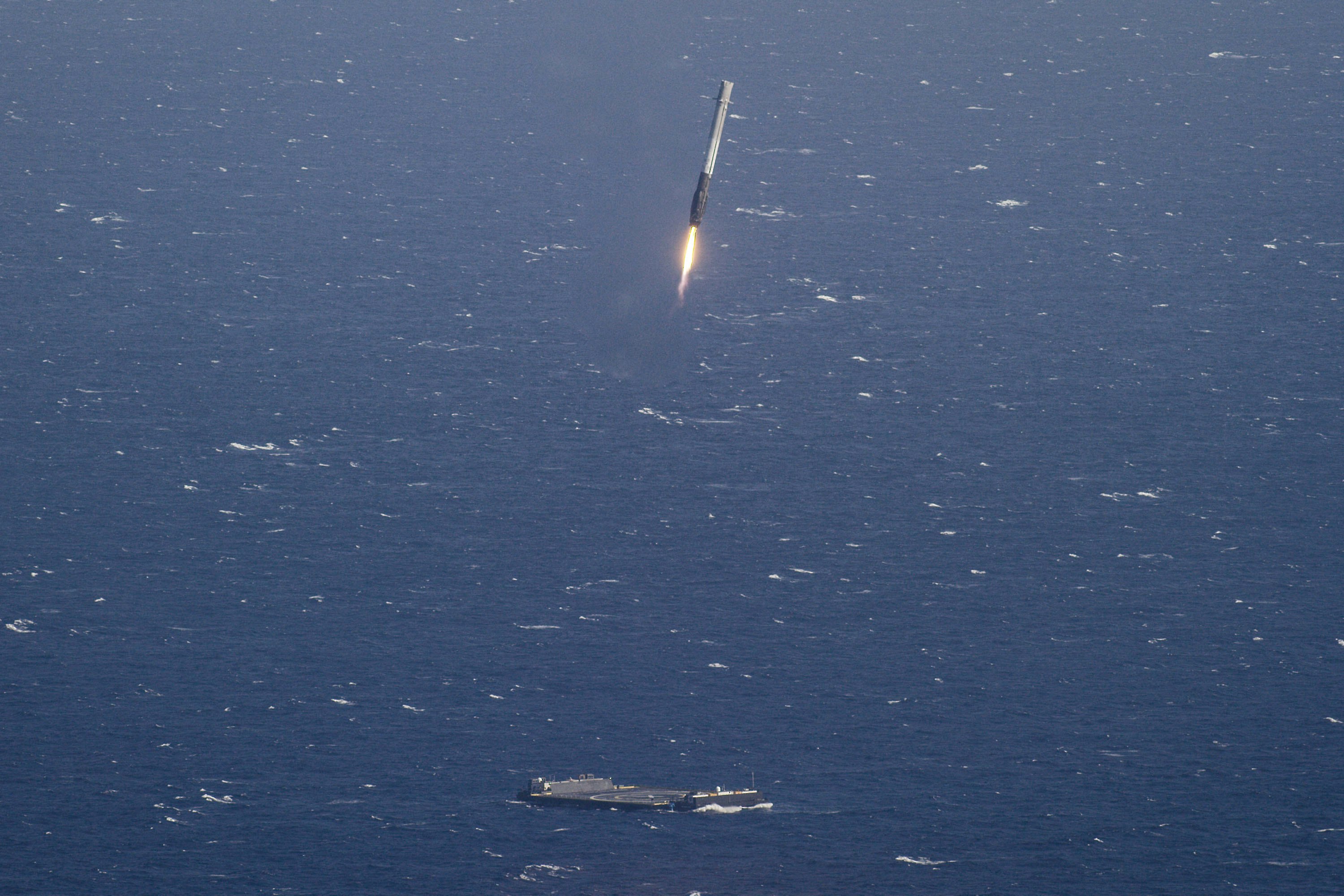 aircraft carrier and missile launching during daytime